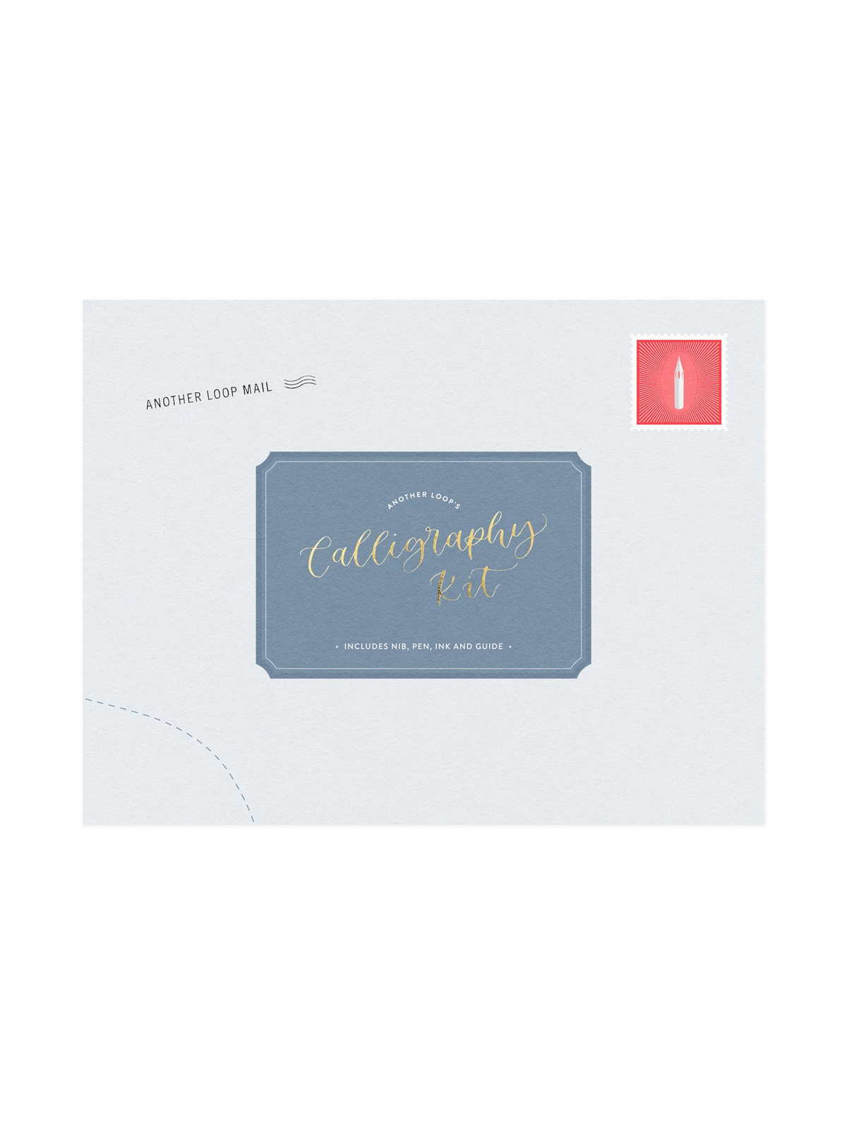 A flat lay of a calligraphy kit package on a white background. The main box is a dusty blue envelope style design with gold foil text reading 'Calligraphy Kit' and 'Another Loop Mail' printed on the left.