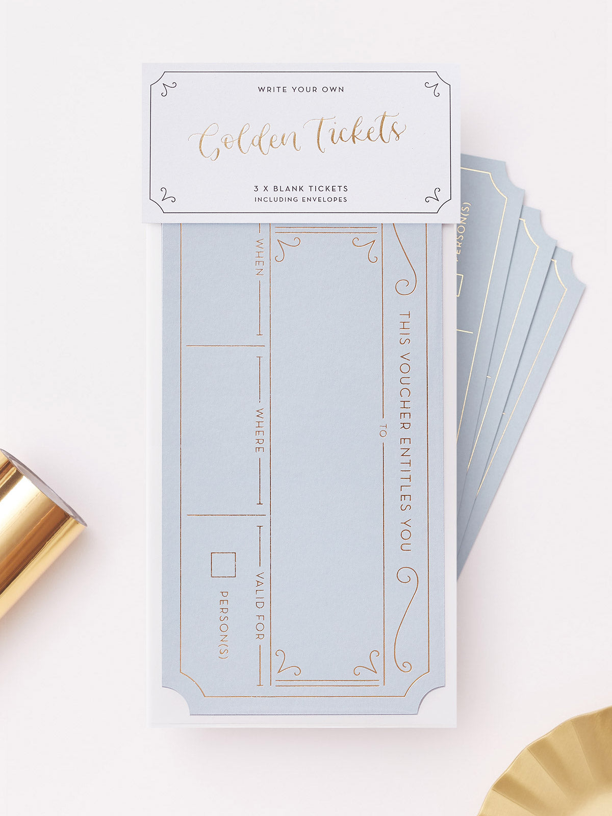 A set of 3 aDusty Blue hot foiled golden tickets. With matching grey envelopes, displayed on a clean white background with decorative gold paper props.