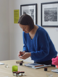Charlotte setting up a beginners modern calligraphy in a bright space in newcastle, north east england