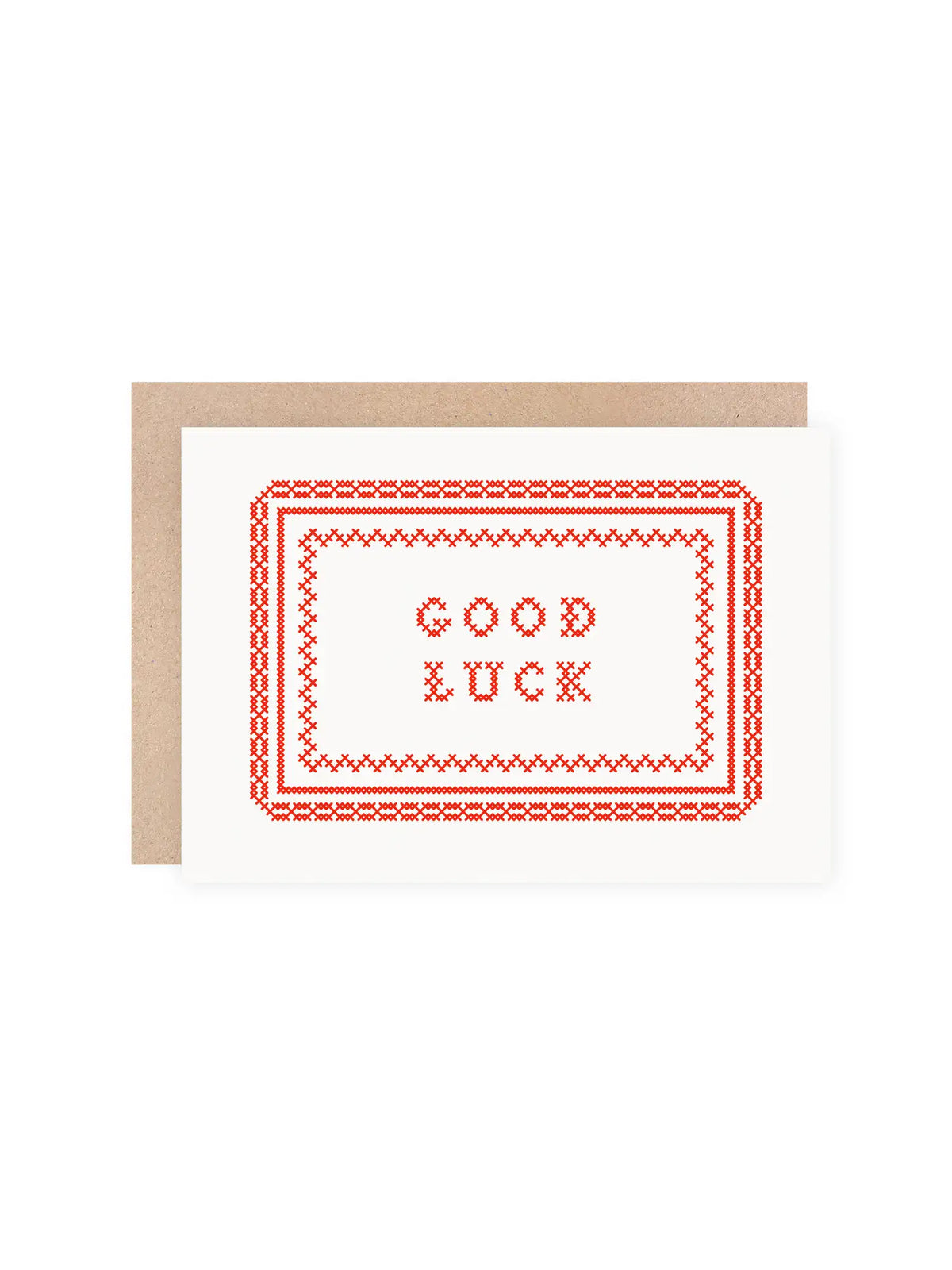 Red screen printed greeting card with 'Good Luck’ on a cross stitch embroidered design, on a white background